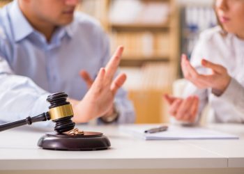 Judge gavel deciding on marriage divorce